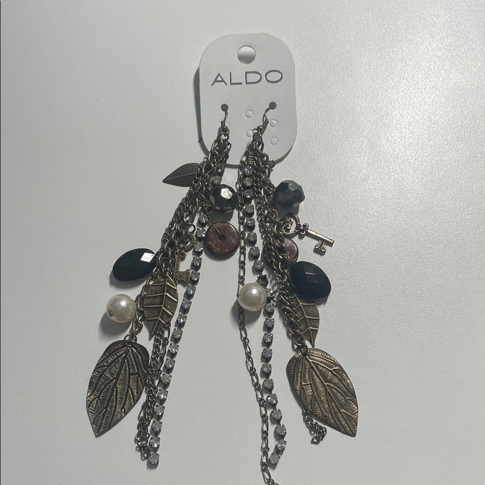 free with purchase
Aldo extra long Earrings